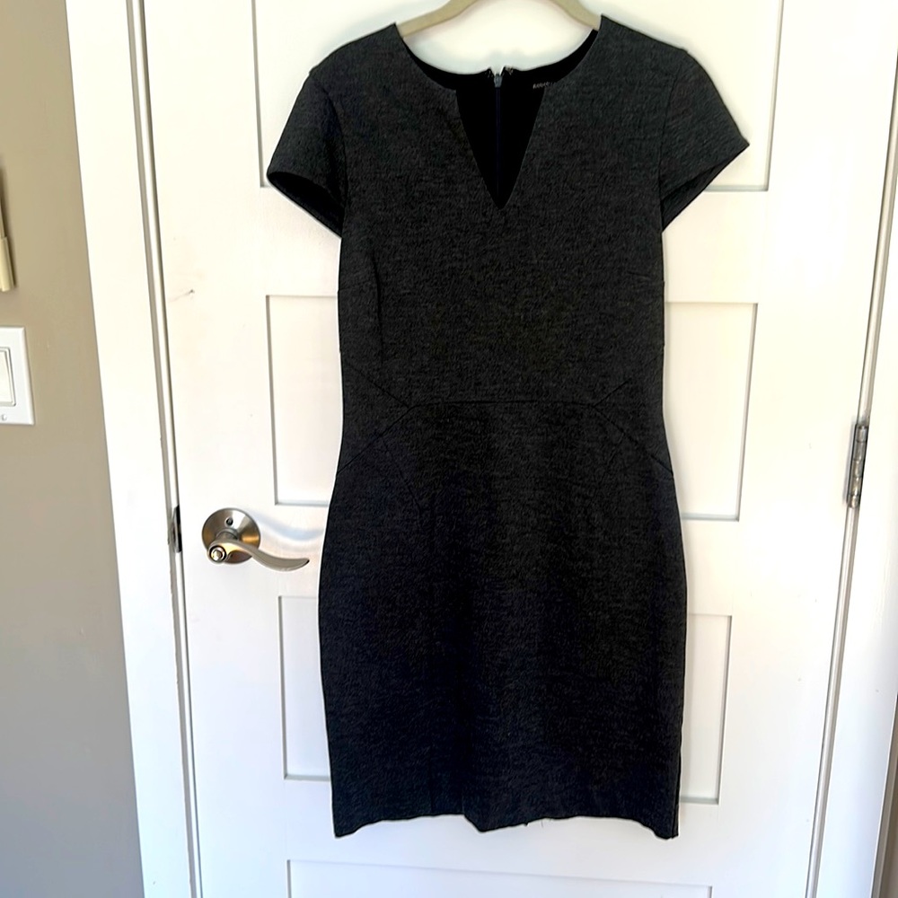 Figure flattering grey dress with v neck and capped sleeves